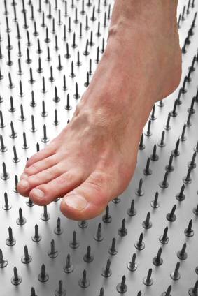 Foot Pain Demonstrated With Bed of Nails